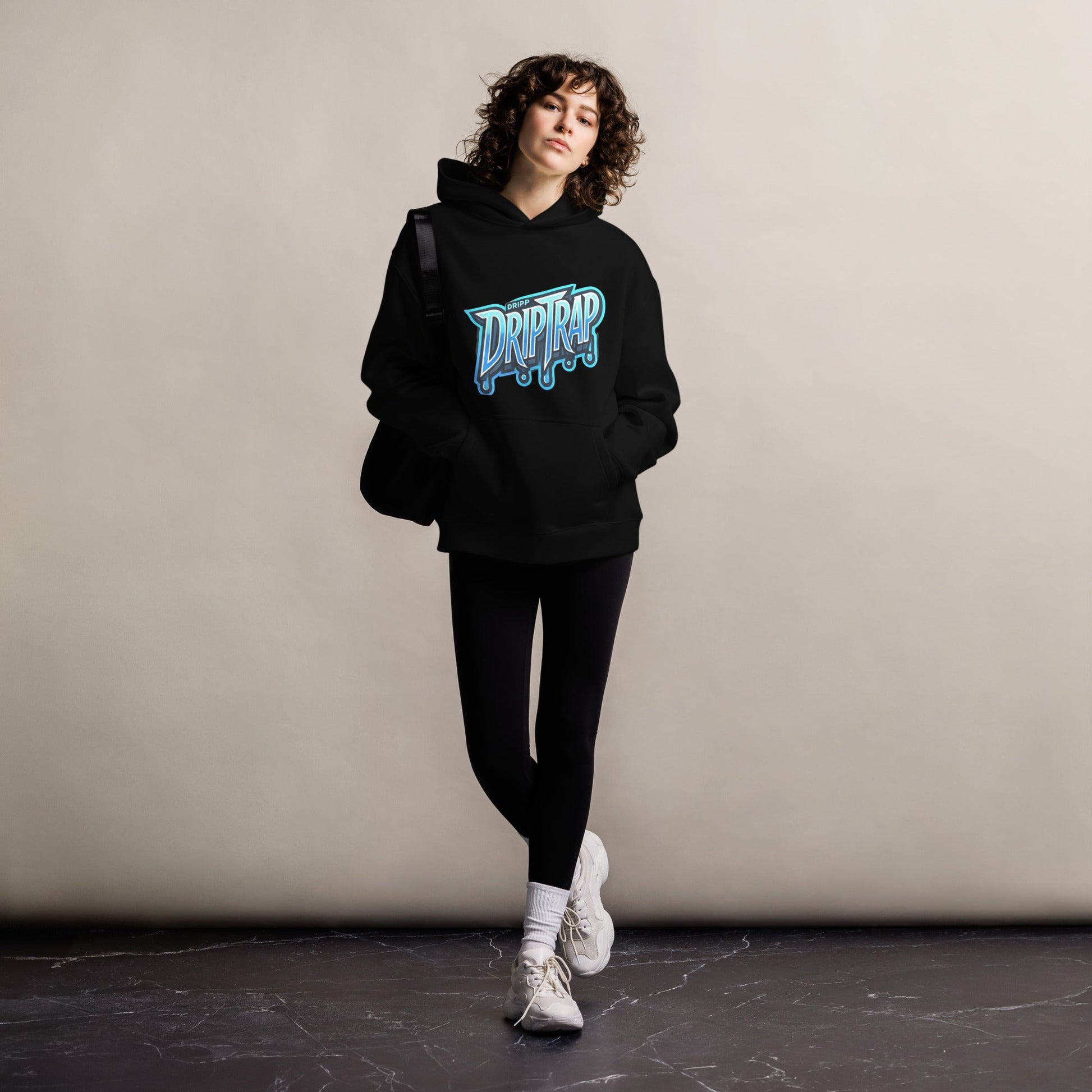 Driptrap hoodie restyling in black, featuring a unique unisex design, 80% cotton, 20% recycled polyester.
